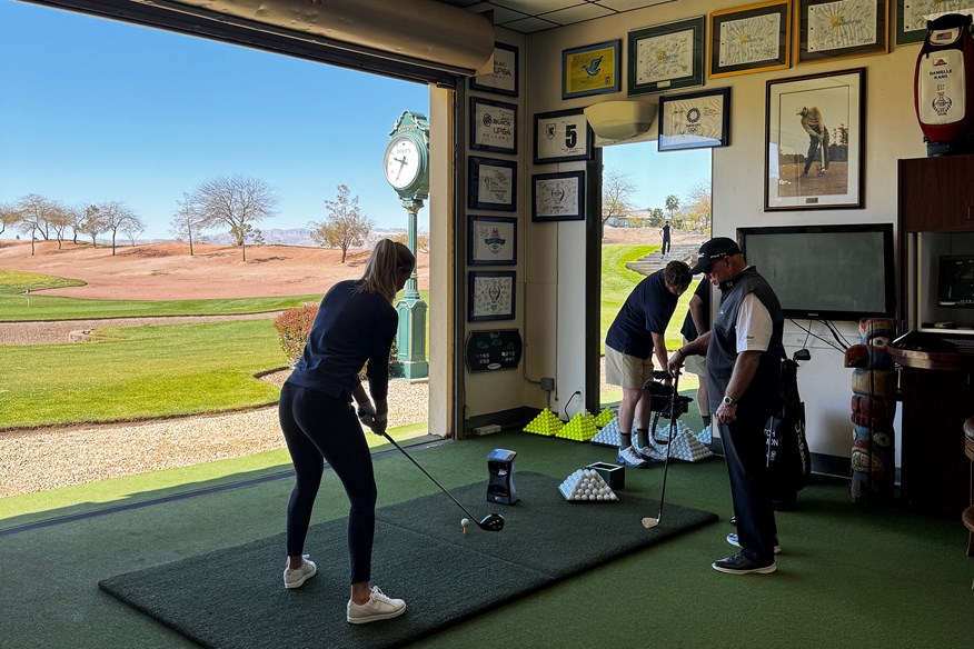 Butch Harmon casts his eye over Iona Stephen's swing.