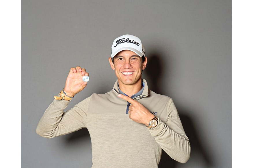 Matteo Manassero of Italy poses with the Challenge Tour coin on Day Four of the Rolex Challenge Tour Grand Final