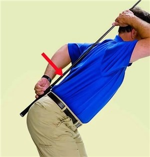 Use the clubshaft to check if your spine has too much curvature