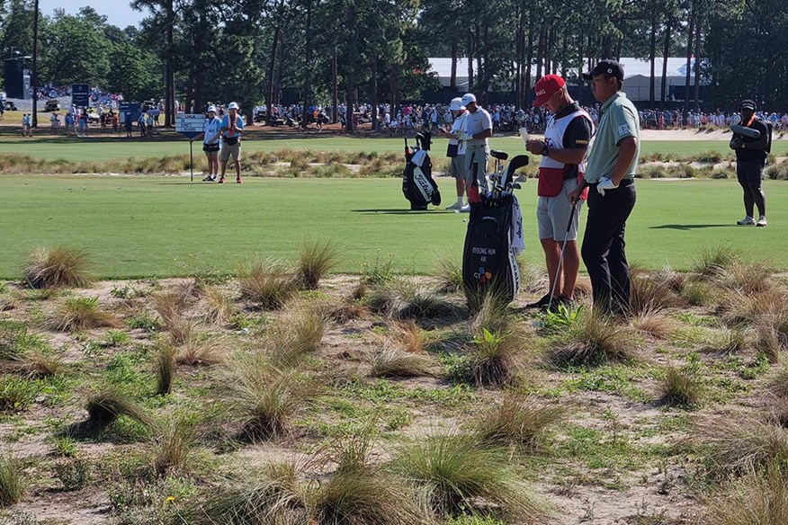 Byeong Hun An running off the fairway at Pinehurst