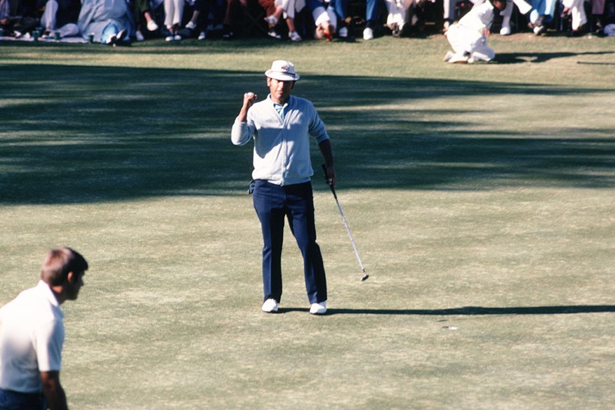 Bobby Mitchell sinks a putt during the 1972 Masters tournament