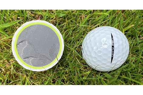 A Vice Pro Plus golf ball cut in half to show the layers inside