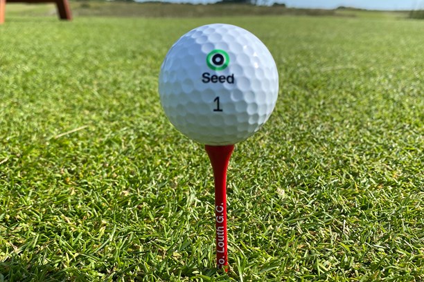 Seed golf ball logo