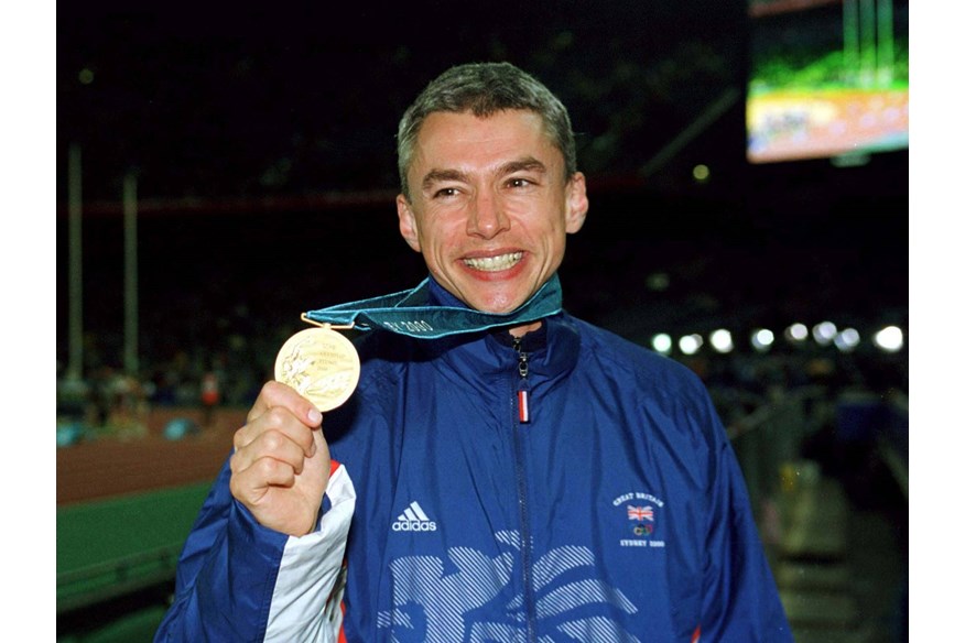 Jonathan Edwards with his Olympic Gold Medal from the Sydney 2000 Olympics