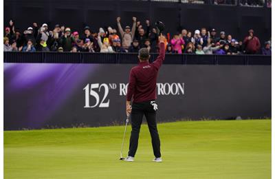 Justin Rose celebrates his birdie on 18.