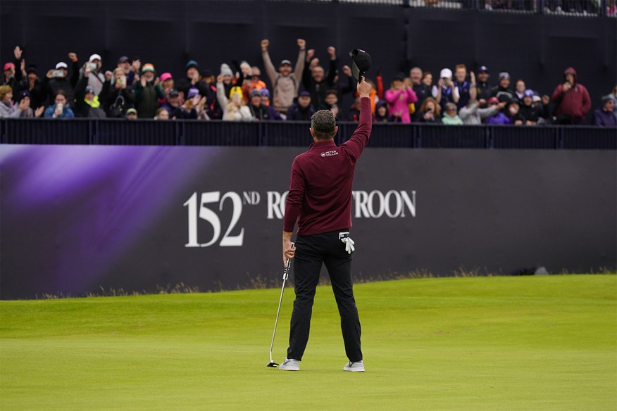 Justin Rose celebrates his birdie on 18.