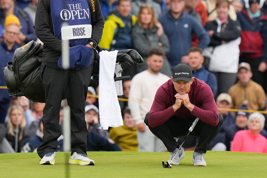 Justin Rose lines up a putt at The Open.