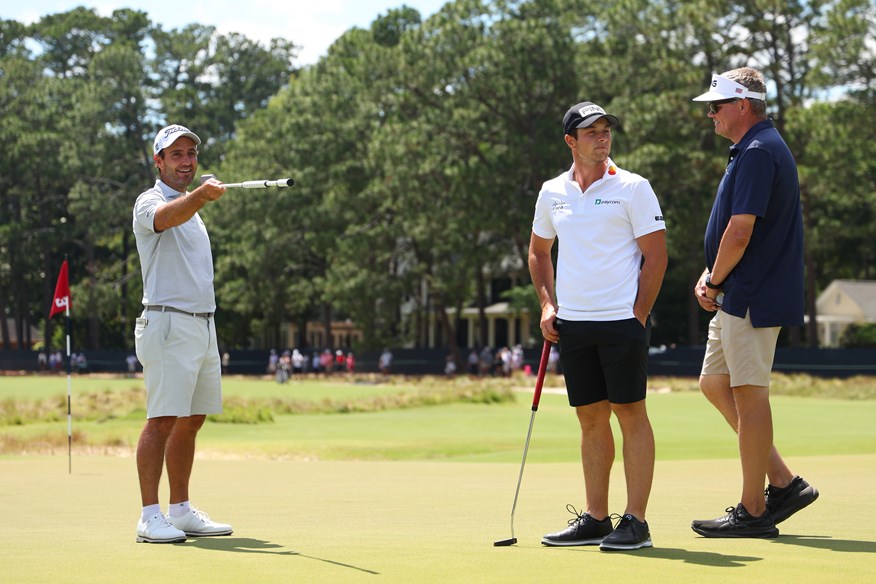 Viktor Hovland with coach Joe Mayo (right) at the 2024 US Open