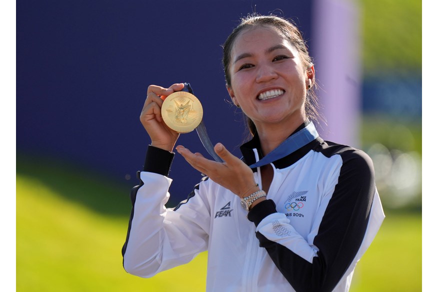 Lydia Ko with her Olympic golf god medal in Paris.