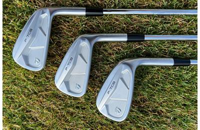 The backs of the TaylorMade P7CB 5, 7 and 9 irons.