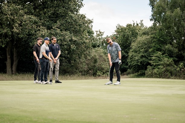 Our tester Adam Binnie using the Wilson PlayerFit Putter