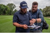 Beef and Lewis inspect the Yardage Book