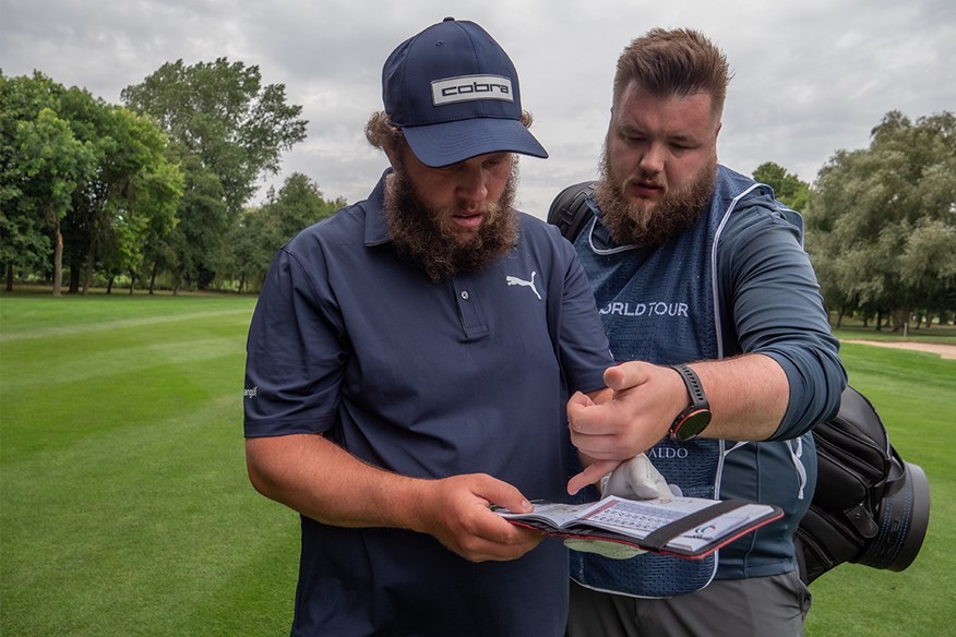 Beef and Lewis inspect the Yardage Book