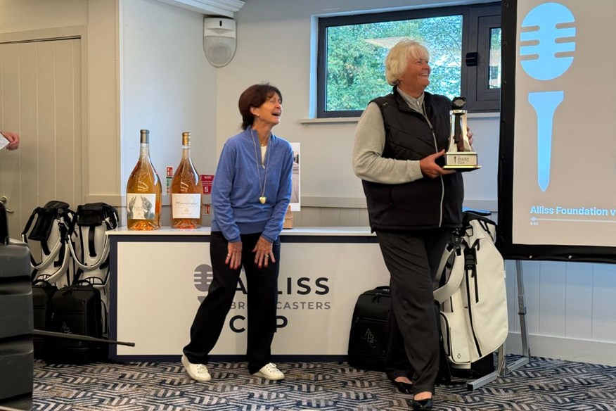 Laura Davies being presented with the Alliss Broadcasters Trophy by Jackie Alliss