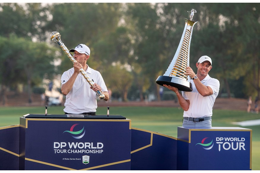 Nicolai Hojgaard and Rory McIlroy celebrate winning the 2023 DP World Tour Championship and the 2023 Race to Dubai respectively.