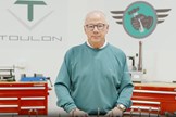 Sean Toulon, stands tall in his Toulon Golf workshop