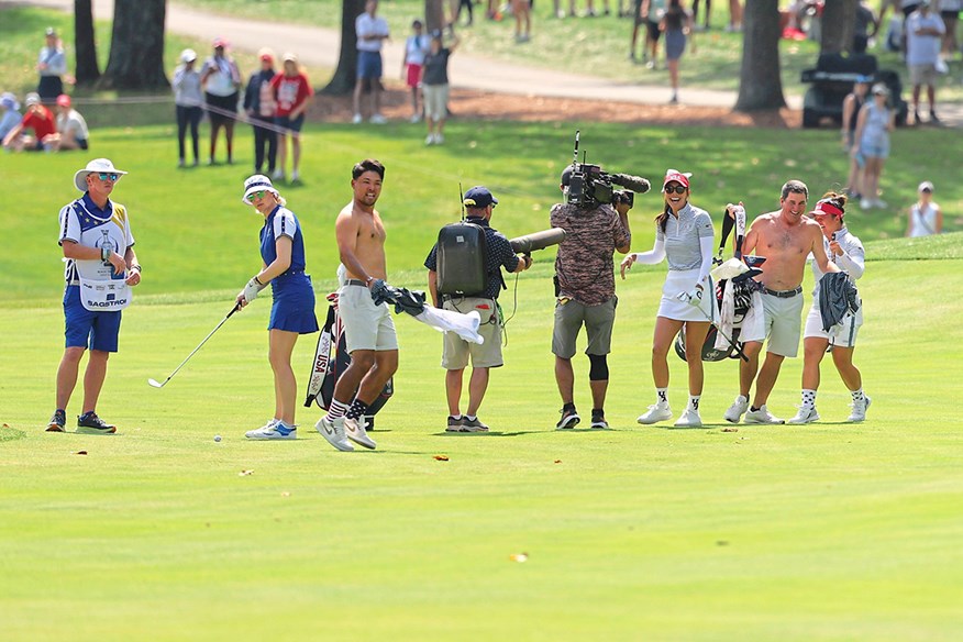 The European team were made to wait while the caddies ran around topless in front of them.