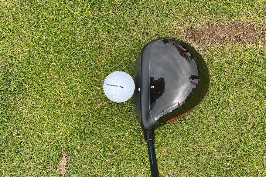 Wilson DYNAPWR Carbon 2025 driver head addressing the golf ball top view