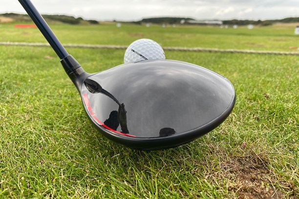 Wilson Dynapower LS driver head addressing the golf ball view from behind