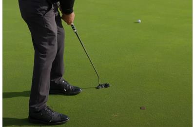 This major-winning golfer explains why he takes divots with his putter.