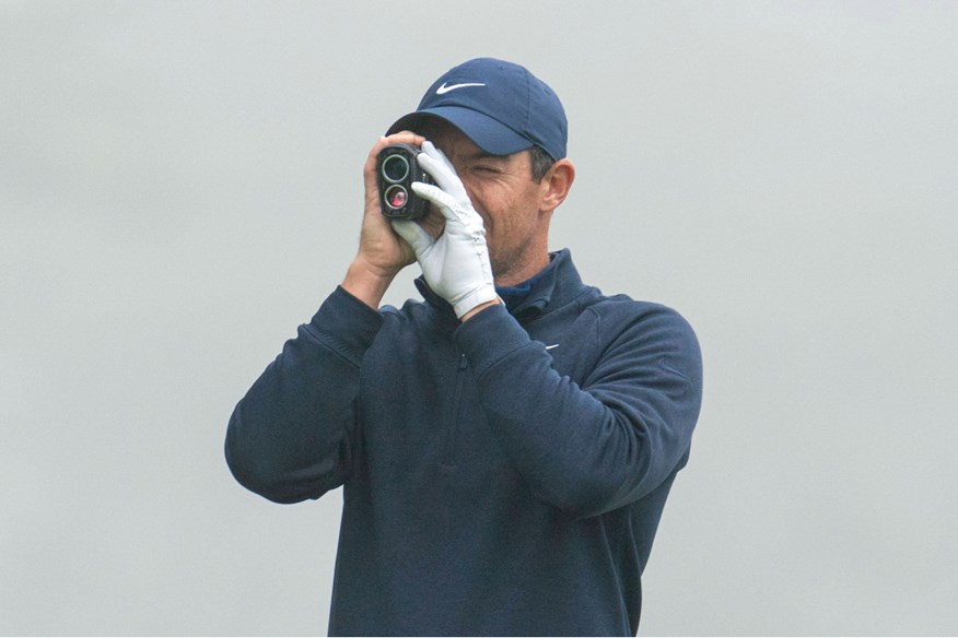 Rory McIlroy using a rangefinder