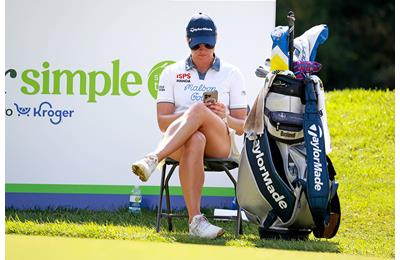 Charley Hull sitting waiting to tee off on the 18th hole during the third round of the Kroger Queen City Championship