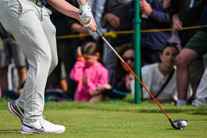 Copy the way tour pros tee their golf balls to hit better drives.