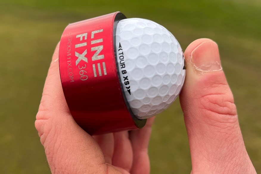 You can use a tool to draw a line on your golf ball.