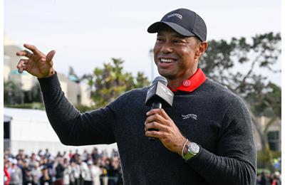 Tiger Woods says he expects a reunification in golf sooner rather than later