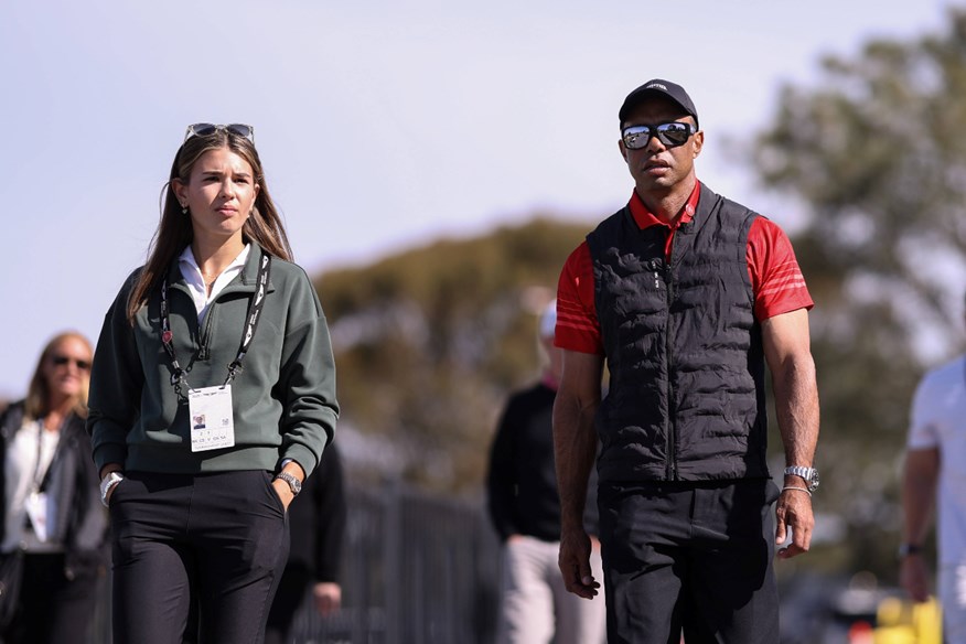 Kai Trump and Tiger Woods in Sun Day Red at the Genesis Invitational.