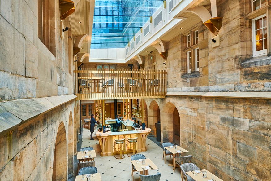 The newly-renovated Cloisters doubles as a breakfast room and posh restaurant and bar.