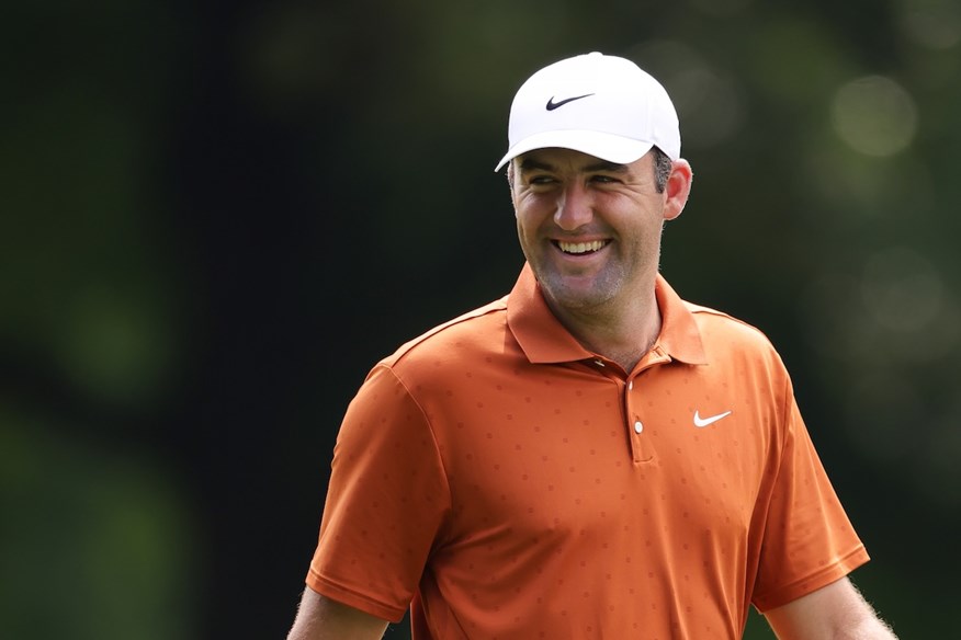 Scottie Scheffler poked fun at his PGA Championship arrest by wearing an orange Nike polo on Wednesday.