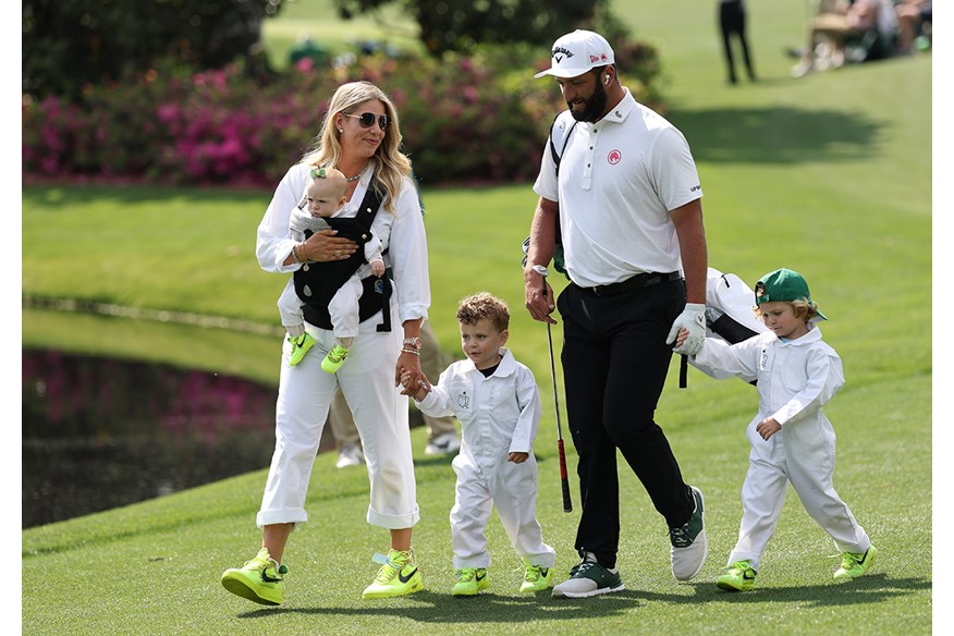Jon Rahm and wife Kelley Cahill, pictured at the 2025 Masters Par 3 Contest with their three children.
