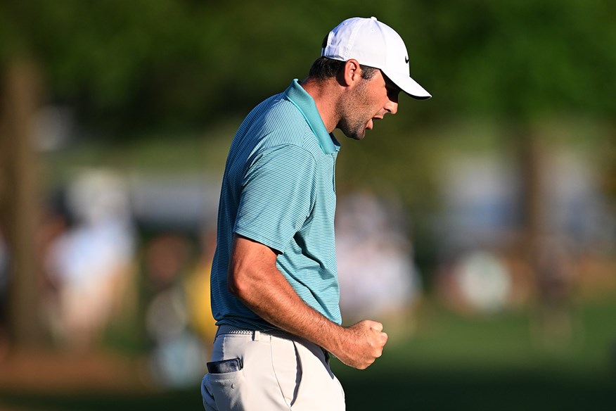 Scottie Scheffler celebrates the final-hole birdie that gives him a three-shot lead heading into the final round of the 2025 PGA Championship.