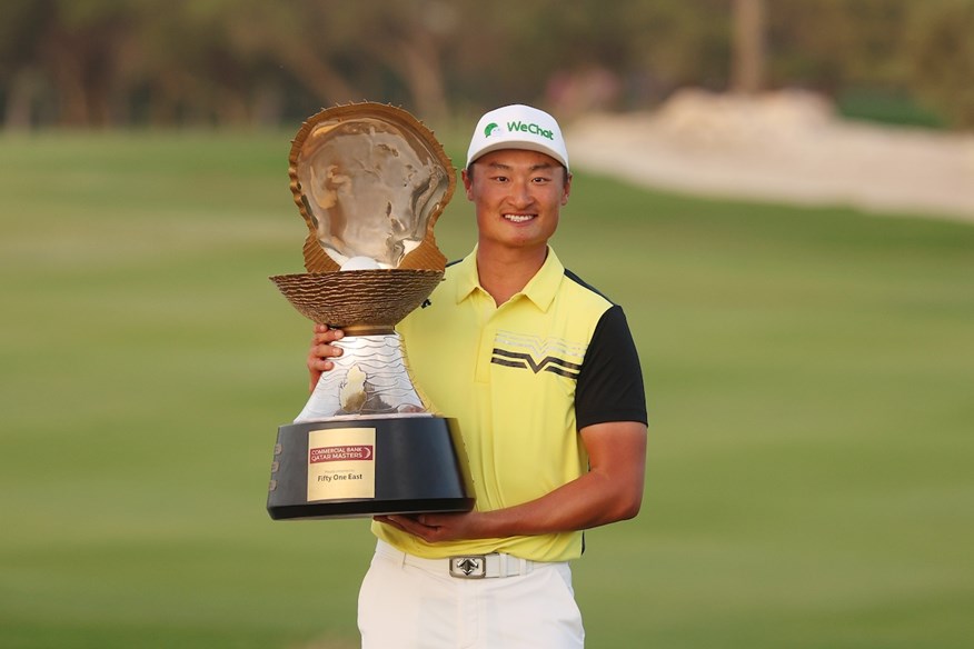 Haotong Li with the Qatar Masters trophy.