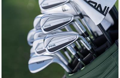 Ping i240 irons in a golf bag.