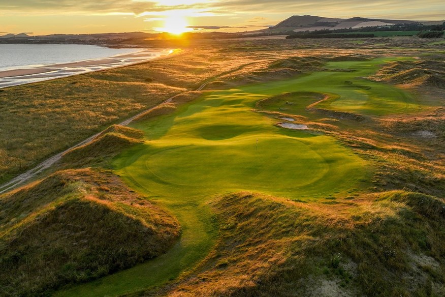 The sun setting over the 13th hole at Dumbarnie Links.
