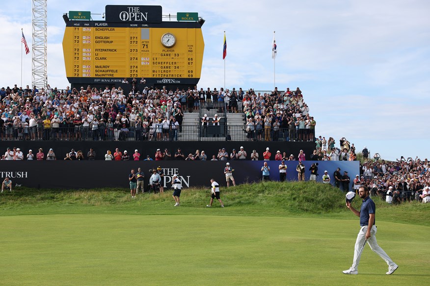 Scottie Scheffler makes the iconic walk up the 72nd hole at the Royal Portrush.