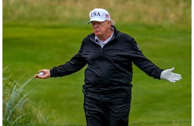 Donald Trump's Turnberry caddie was caught helping him on the Scottish links.