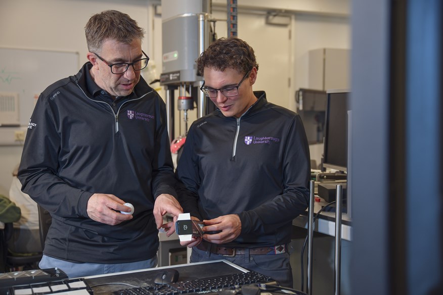 Dr. Jonathan Roberts and James Morris, of Loughborough University, discuss one of the golf ball models during our 2025 robot test.