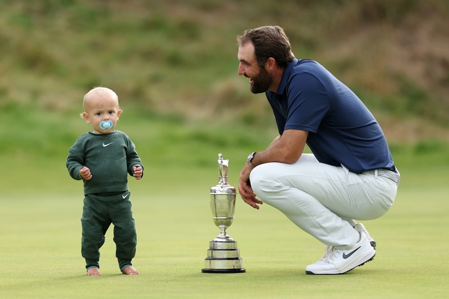 Scottie Scheffler and son Bennett after winning The Open.