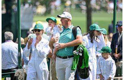 Sepp Straka with his wife Paige and son Leo