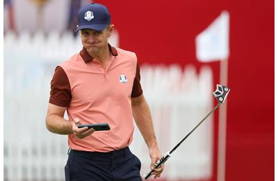 Justin Rose shows off the "salmon" Ryder Cup outfit.