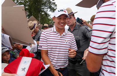 Collin Morikawa smiles as he makes his way through the hoards of home fans at the Ryder Cup in New York.