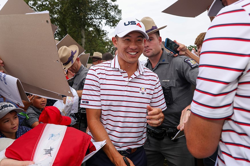Collin Morikawa smiles as he makes his way through the hoards of home fans at the Ryder Cup in New York.