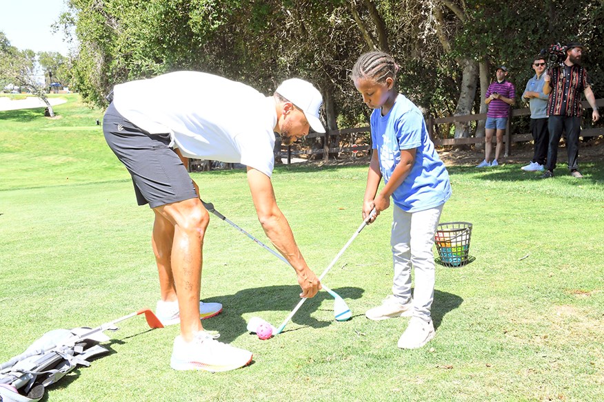 Giving back to the next generation comes naturally to one of sport’s most down-to-earth individuals.