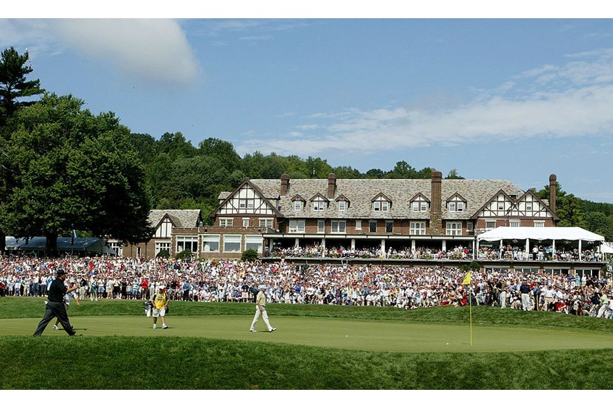 Phil Mickelson celebrates his chip onto the 18th green during the completion of the final round of the 2005 PGA Championship