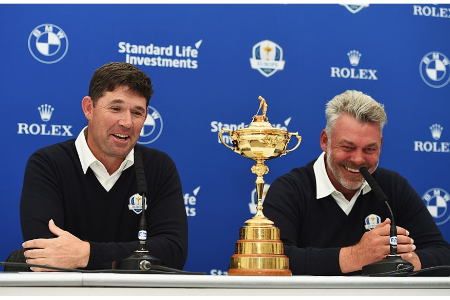 Europe Ryder Cup Captain Darren Clarke laughs with one of his vice-captains Padraig Harrington during a press conference. 