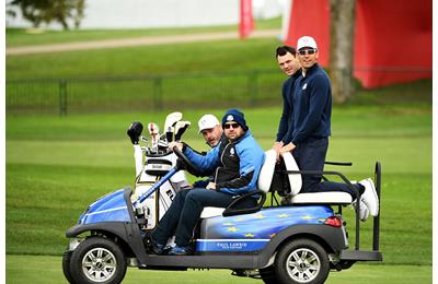  Martin Kaymer and Rafa Cabrera Bello of Europe ride a buggie during practice prior to the 2016 Ryder Cup at Hazeltine National Golf Club