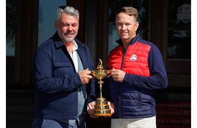 Team captains Darren Clarke and Davis Love III pose with the Ryder Cup Trophy prior to the 2016 Ryder Cup at Hazeltine National